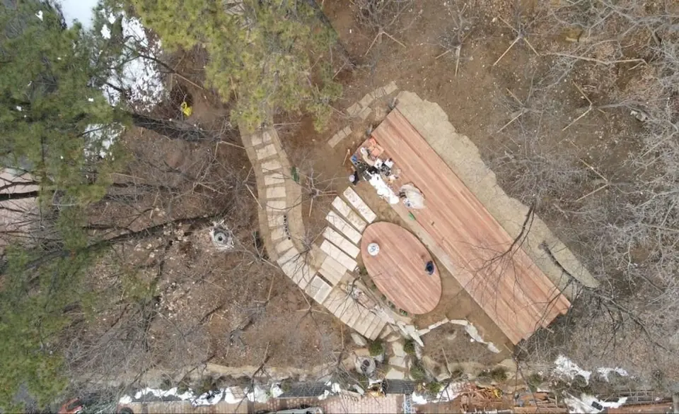 Sekyung High School forest · 2023–24 — A deck laid among the existing trees so students can sit in the woods. Design and construction.